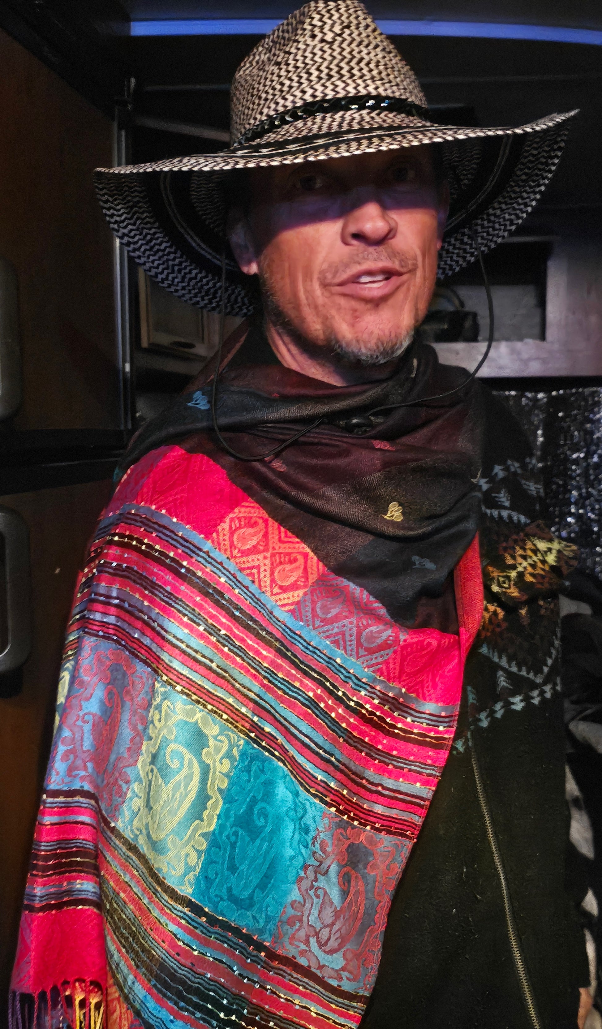 Festival goer wearing the striped poncho scarf