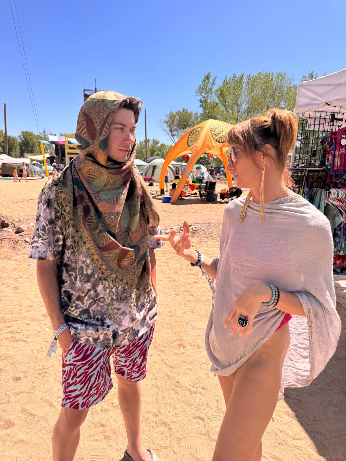 Teal and brown Large Paisley poncho scarf styled for festival and beach